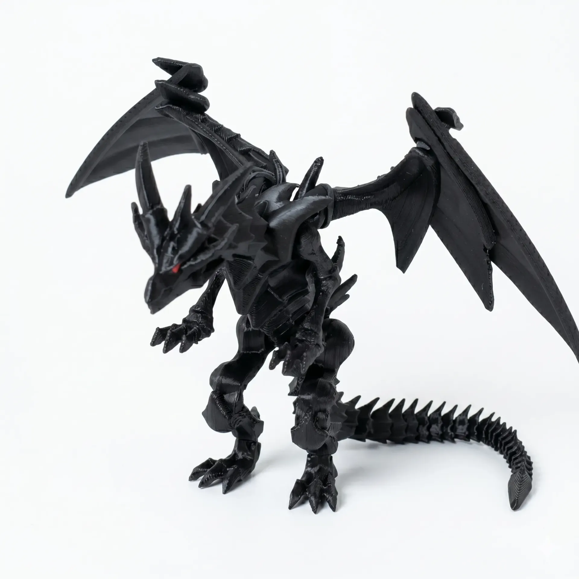 [B] Dragón negro de ojos rojos